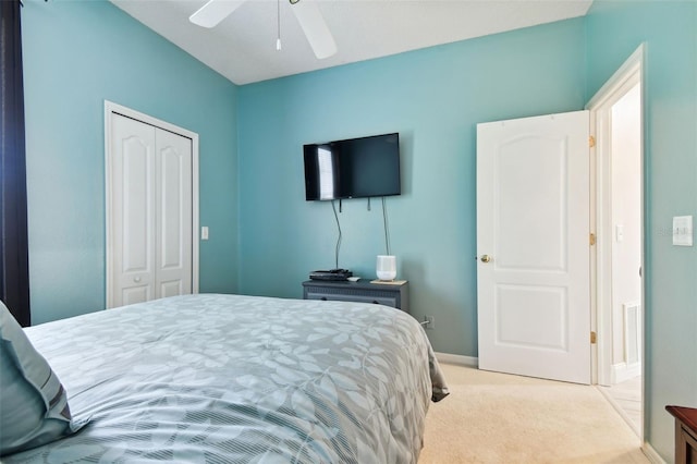 1687 Starling Dr, Tarpon Springs, FL 34689 - carpeted bedroom with a closet, baseboards, and a ceiling fan