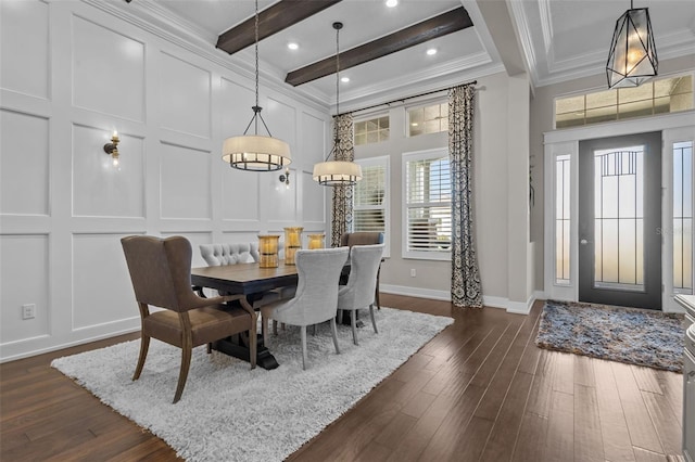 dining room with beamed ceiling, a high ceiling, dark hardwood / wood-style floors, and ornamental molding