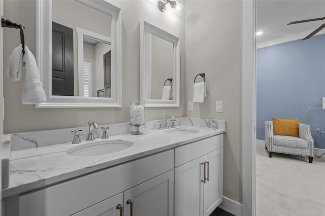 bathroom featuring vanity and ceiling fan