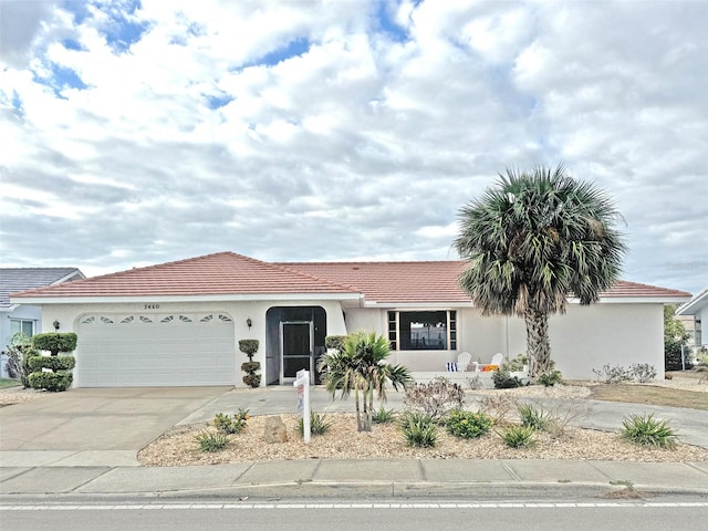 view of front of home with a garage