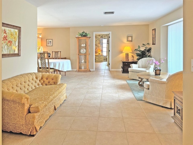 living room with light tile patterned floors