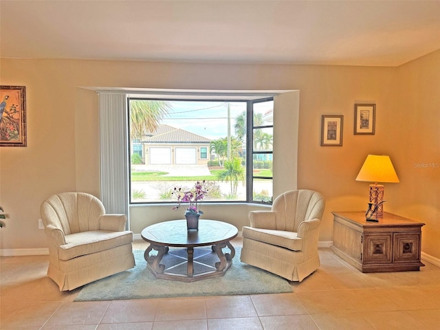 living area featuring light tile patterned flooring