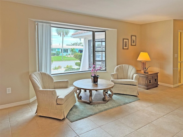 sitting room with light tile patterned floors