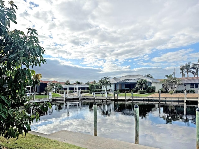 dock area with a water view