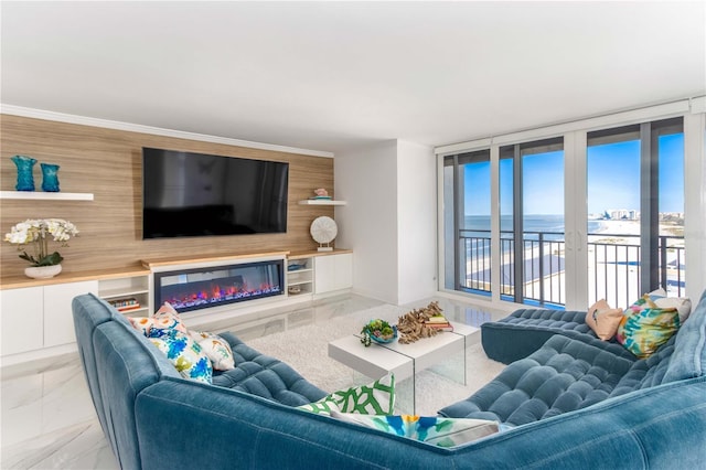 1390 Gulf Blvd Unit 1204, Clearwater, FL 33767 - living room featuring light marble finish flooring and a glass covered fireplace