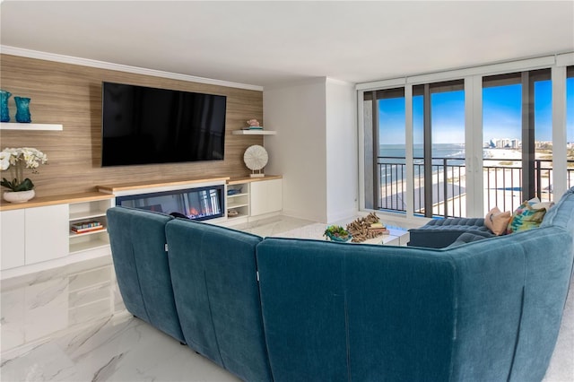 living room featuring floor to ceiling windows and crown molding