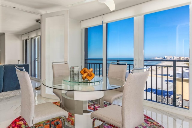 1390 Gulf Blvd Unit 1204, Clearwater, FL 33767 - dining area with a water view and marble finish flooring