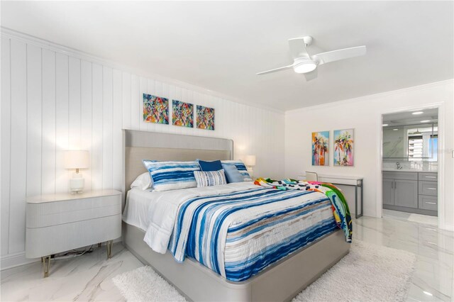 bedroom with connected bathroom, ceiling fan, and ornamental molding