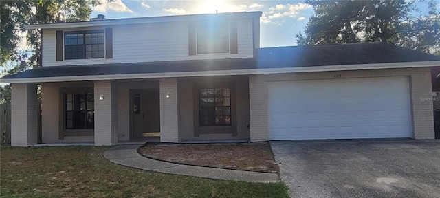 view of front facade featuring a porch and a garage