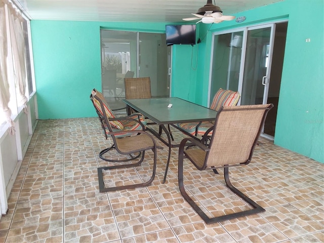 dining area with ceiling fan