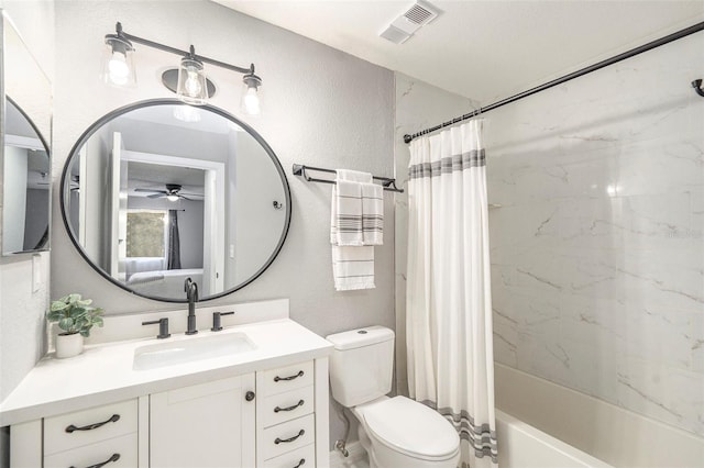 full bathroom with visible vents, a textured wall, toilet, shower / bath combo with shower curtain, and vanity