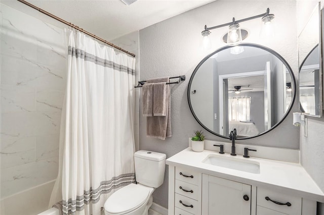 bathroom featuring a textured wall, vanity, toilet, and shower / bath combo with shower curtain