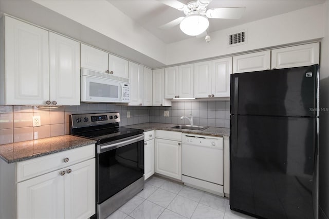 kitchen featuring backsplash, white appliances, ceiling fan, sink, and white cabinets