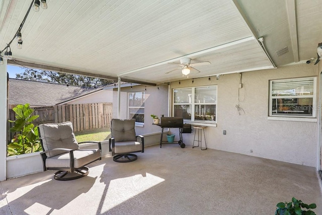 view of patio with ceiling fan