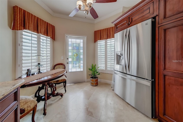 kitchen featuring ornamental molding, ceiling fan, and stainless steel refrigerator with ice dispenser