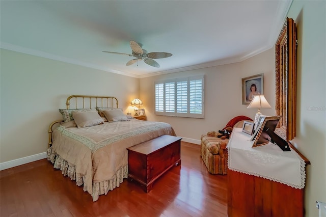 bedroom with ceiling fan, ornamental molding, and hardwood / wood-style floors