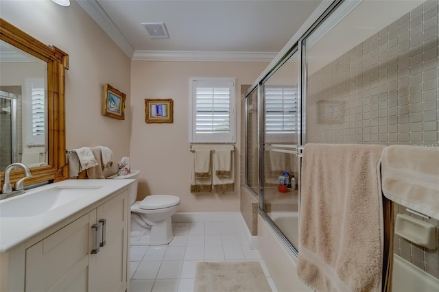 full bathroom featuring tile patterned flooring, crown molding, vanity, and toilet