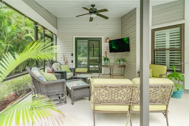 view of patio featuring ceiling fan