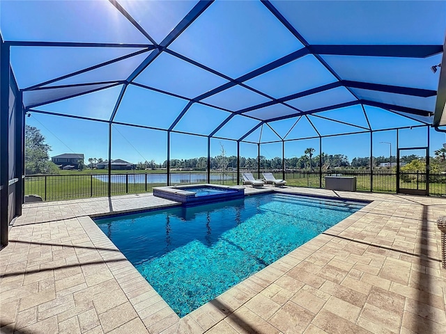 view of pool with a lawn, a lanai, an in ground hot tub, a water view, and a patio