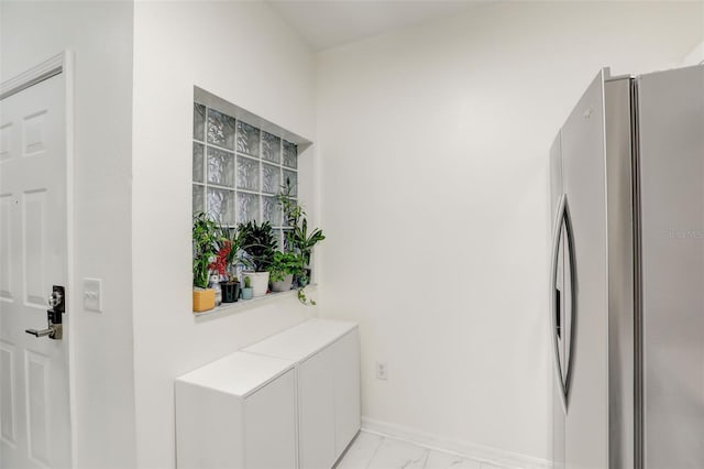 kitchen with stainless steel fridge