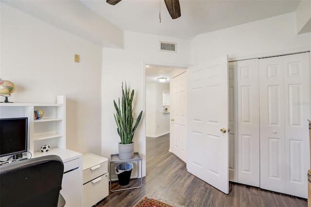 office with ceiling fan and dark hardwood / wood-style floors