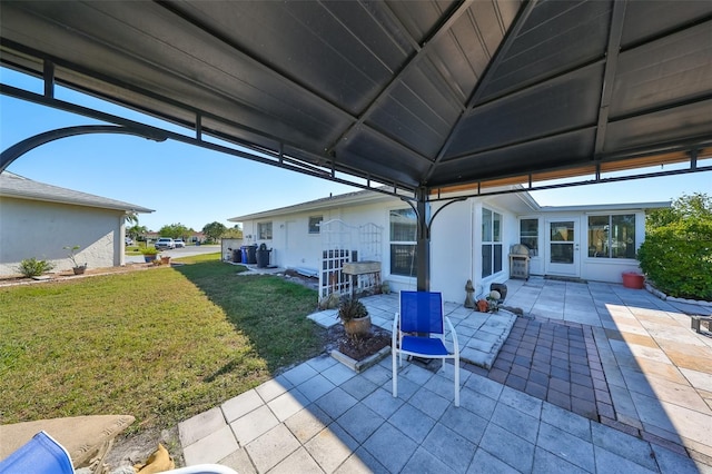 view of patio featuring a gazebo and a grill