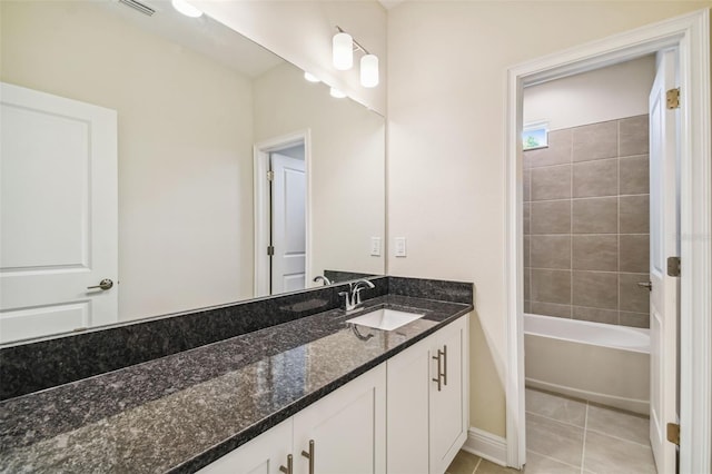 58251/2 S 5th St, Tampa, FL 33611 - full bath with tile patterned flooring, vanity, and baseboards