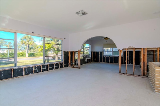 interior space with ceiling fan and a healthy amount of sunlight