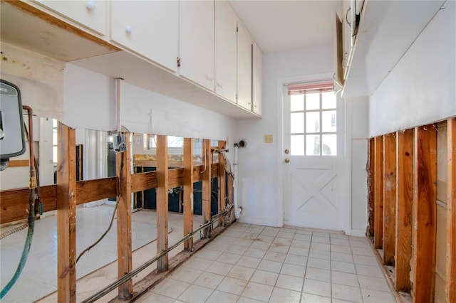 interior space with light tile patterned floors