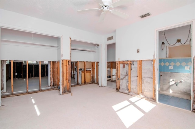 unfurnished bedroom with a closet and ceiling fan