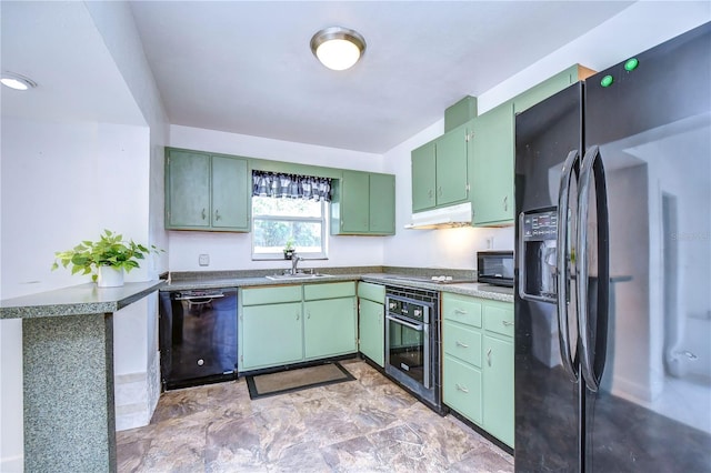 kitchen featuring kitchen peninsula, sink, green cabinets, and black appliances