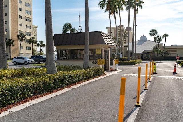 4575 Cove Cir Unit 202, Saint Petersburg, FL 33708 - view of asphalt road featuring traffic signs and street lighting