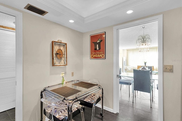 4575 Cove Cir Unit 202, Saint Petersburg, FL 33708 - dining room with a chandelier, dark tile patterned floors, recessed lighting, baseboards, and a raised ceiling