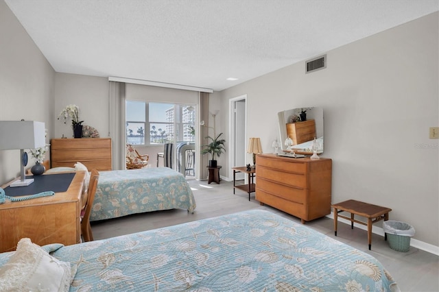 bedroom featuring a textured ceiling