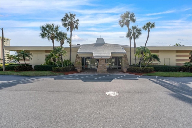 4575 Cove Cir Unit 202, Saint Petersburg, FL 33708 - view of building exterior featuring uncovered parking