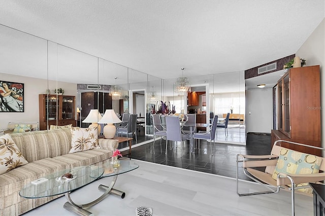 living room featuring a textured ceiling