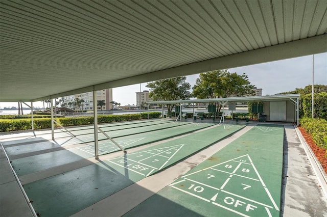 4575 Cove Cir Unit 202, Saint Petersburg, FL 33708 - view of community with shuffleboard