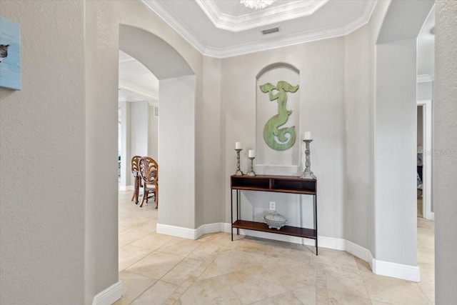 hallway featuring ornamental molding