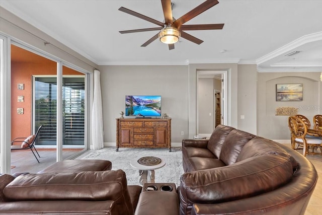 living room with crown molding and ceiling fan