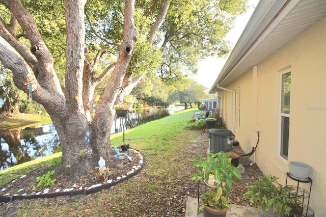 view of yard with a water view