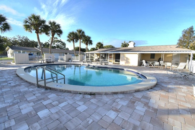 view of pool featuring a patio