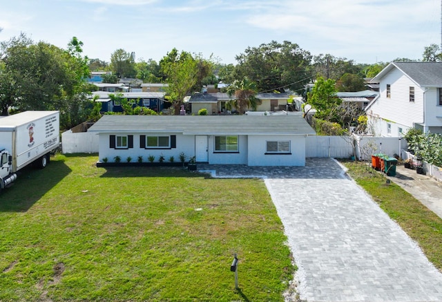 view of front facade with a front lawn