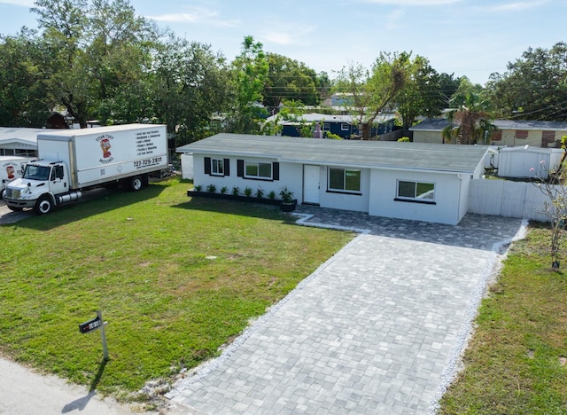 view of front of home with a front lawn