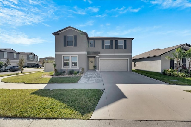 view of front of property with a garage and a front lawn