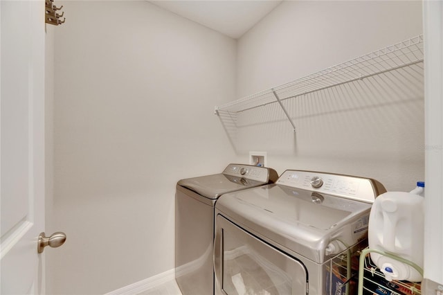 laundry area with washer and clothes dryer