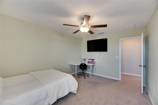 bedroom featuring ceiling fan and light colored carpet