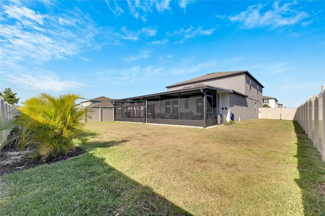 view of yard with a sunroom