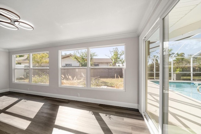 unfurnished sunroom with a wealth of natural light