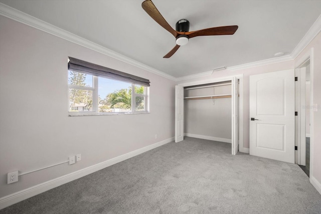 13632 Imperial Groves Dr S, Largo, FL 33774 - unfurnished bedroom featuring carpet flooring, ornamental molding, a closet, and a ceiling fan