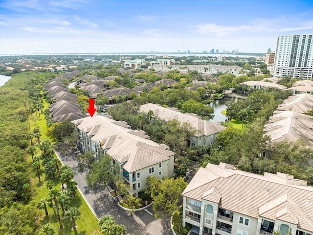 birds eye view of property featuring a water view